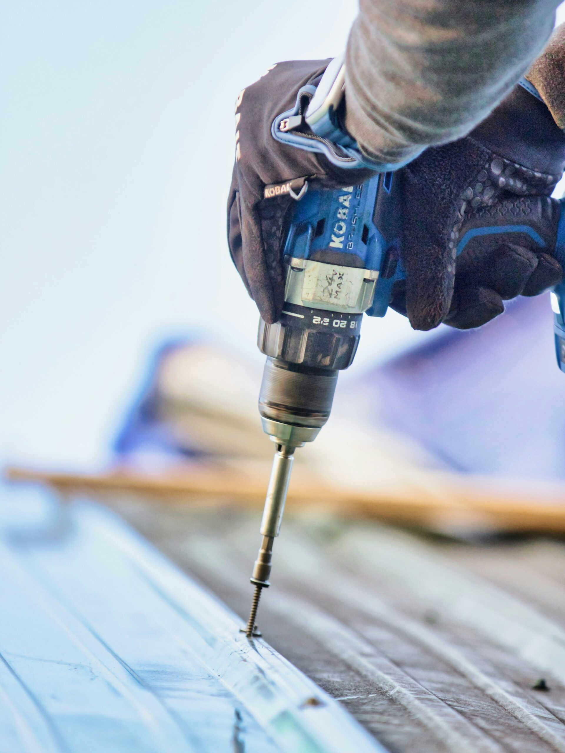 Drilling shingles on roof